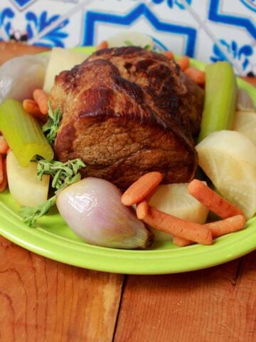a Keto Pot Roast and Vegetables on a green platter