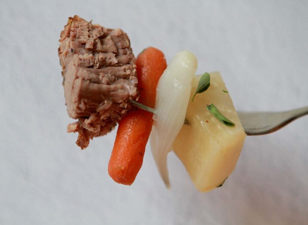 a forkful of Rump Roast and vegetables