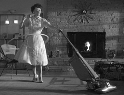 a gif of a 1950's housewife vacuuming and hula hooping
