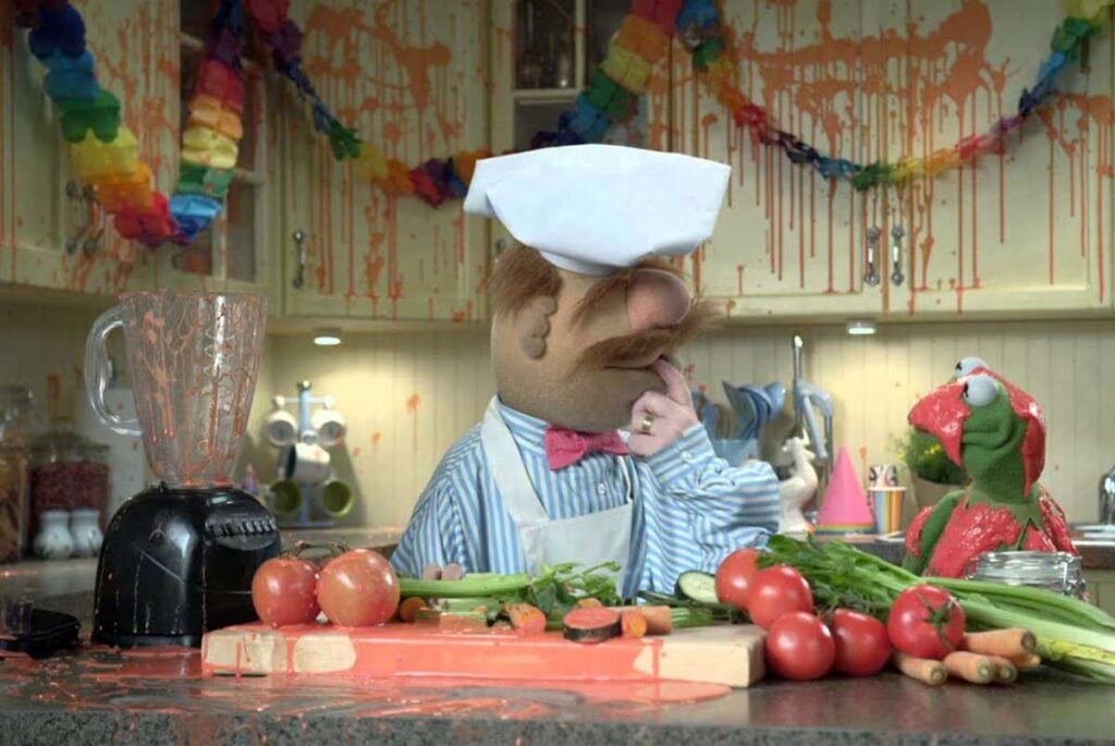 the Swedish Chef in a messy kitchen