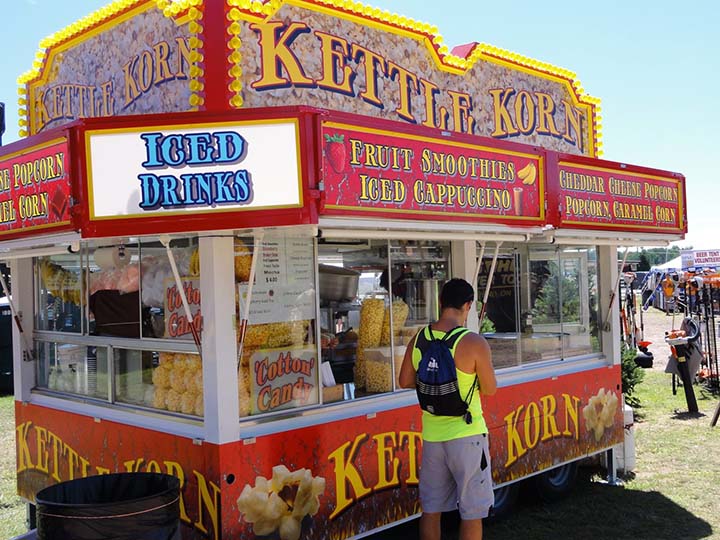 a stand for Kettle Korn at a fairgrounds