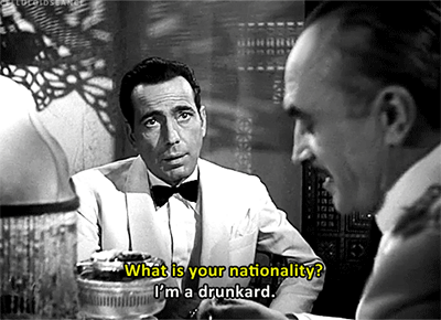 a gif of Humphrey Bogart in Casablanca at the bar
