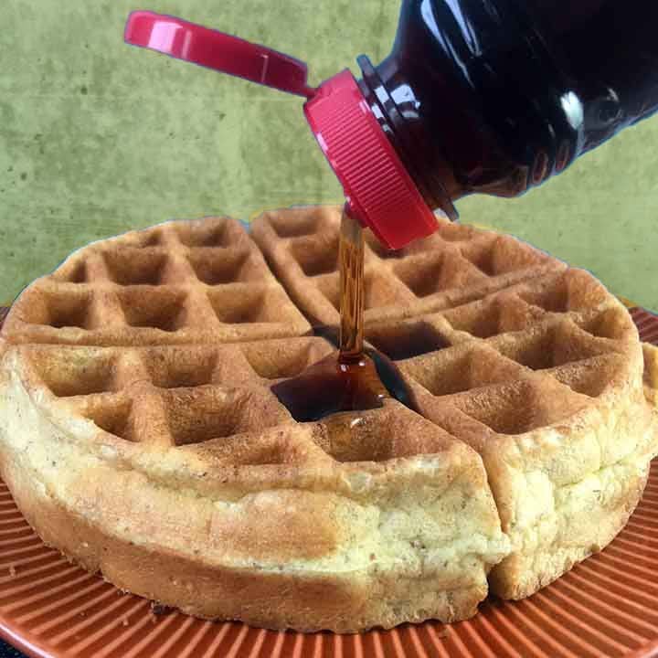 syrup pouring on Paleo waffle