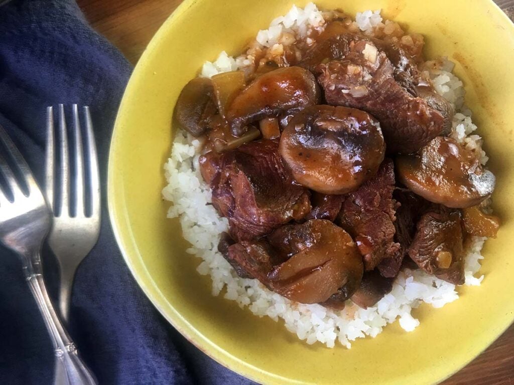 a yellow bowl of Keto Beef Stew