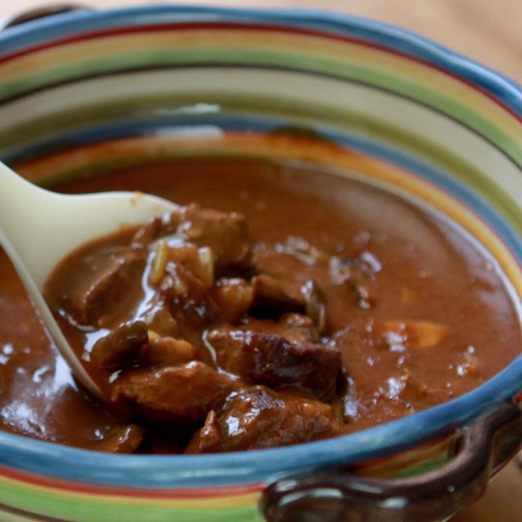 A colorful bowl of low carb beef stew