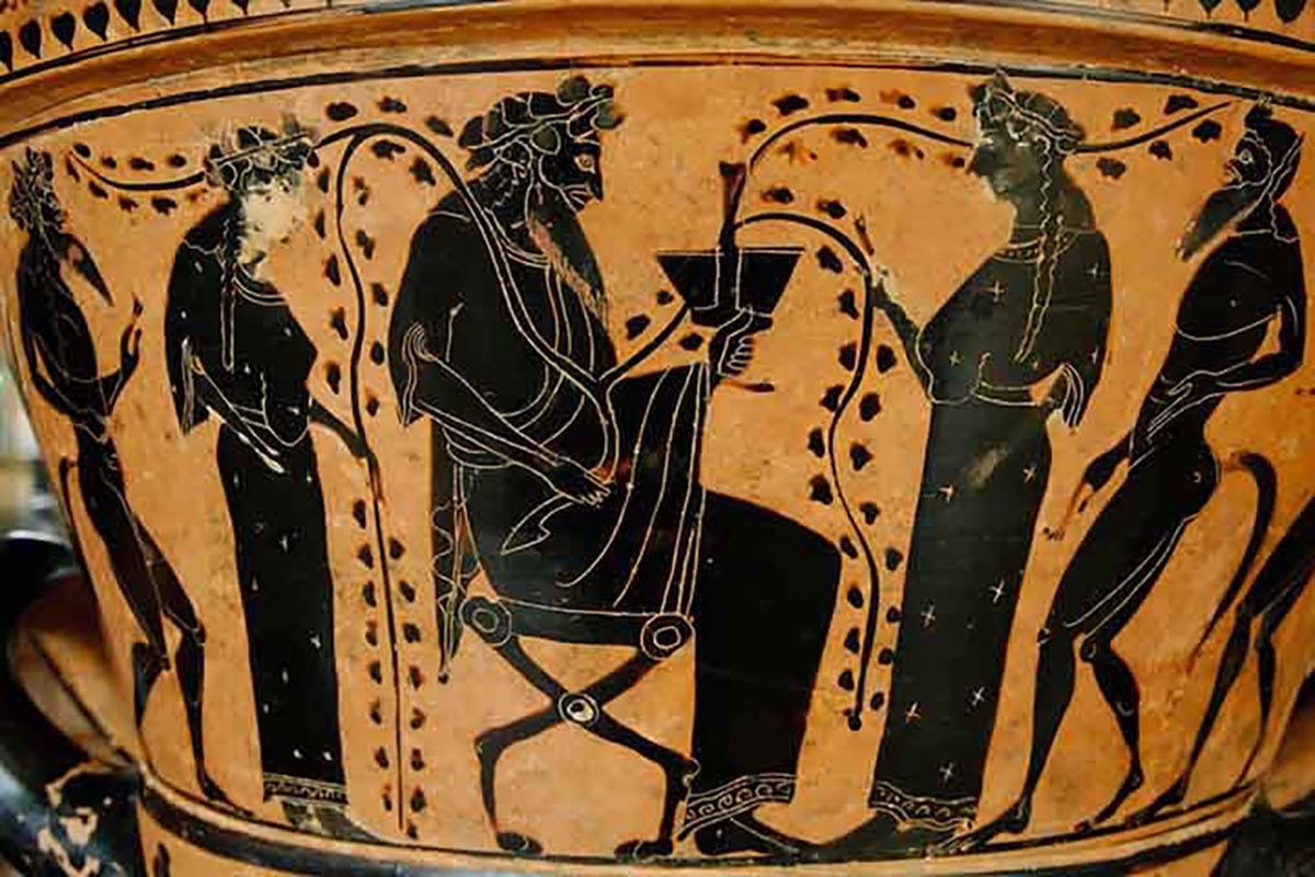 a Greek urn with people eating food.