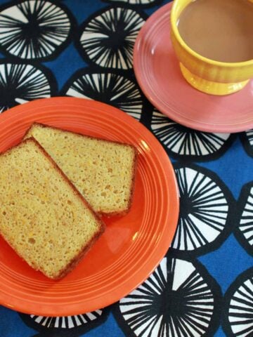 2 slices of Keto Banana Bread with a cup of coffee