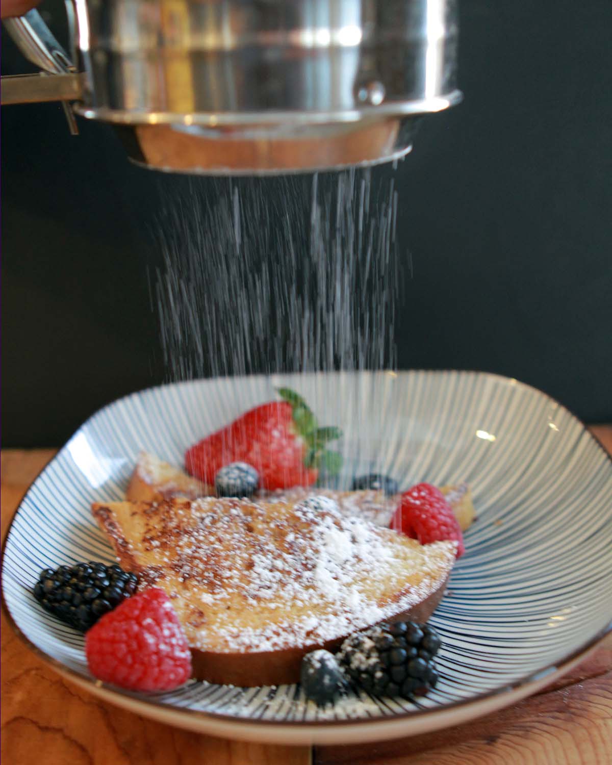 a sifter sprinkles sugar-free powdered sweetener