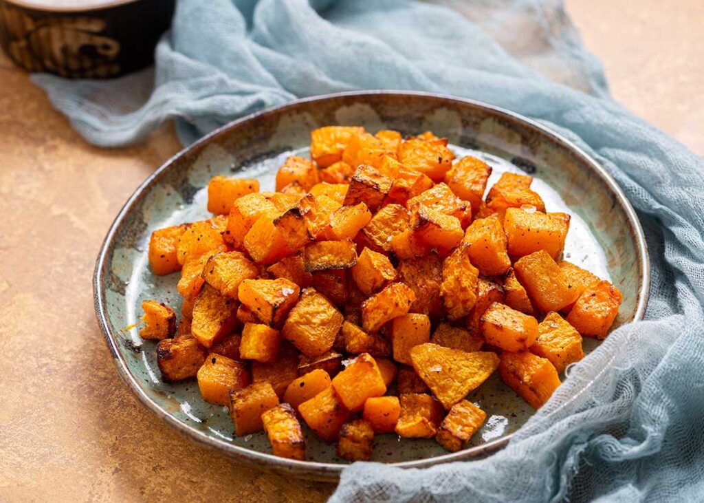 a plate of cubed butternut squash