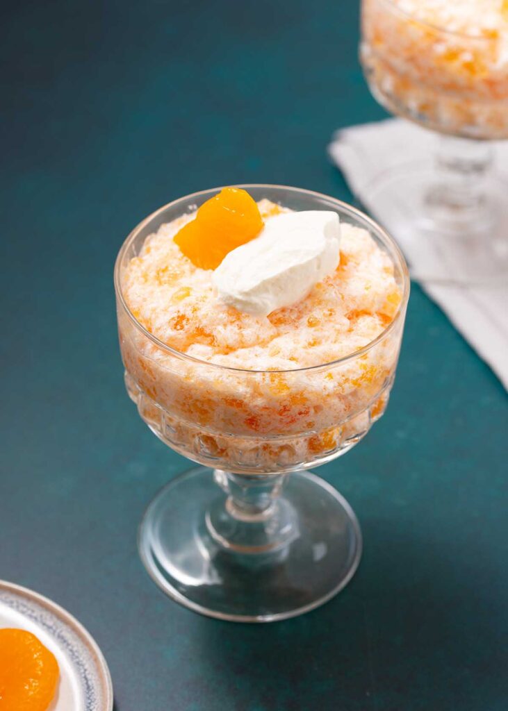 two bowls of Orange Jello Salad