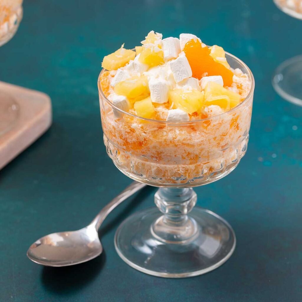 a glass dish of Mandarin Orange Jello Salad