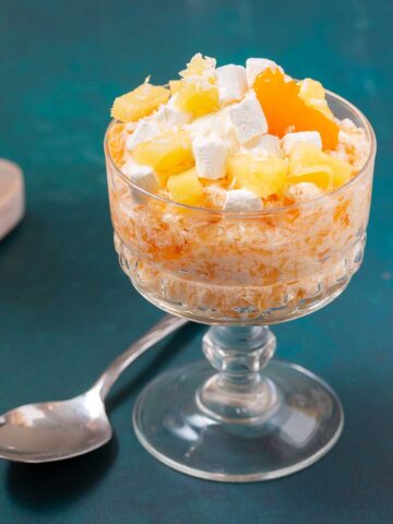 a glass dish of Mandarin Orange Jello Salad